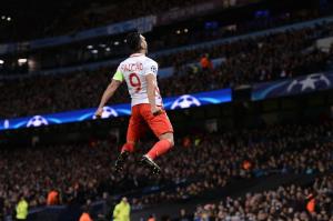 TOPSHOT - Monaco's Colombian forward Radamel Falcao celebrates scoring an equalising goal for 1-1 during the UEFA Champions League Round of 16 first-leg football match between Manchester City and Monaco at the Etihad Stadium in Manchester, north west England on February 21, 2017. / AFP PHOTO / Oli SCARFF